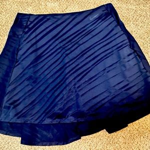 Nike dry fit golf skirt size small excellent condition. Only worn once.